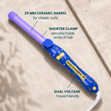 The Beachwaver Electric Sky B1 rotating curling iron featuring a 1-inch barrel in a purple and dark blue finish with yellow lightning and pink stars, ideal for creating tight, defined curls and waves.