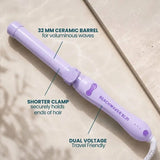 The Pastel Lilac B1.25 rotating curling iron featuring a 32 MM barrel in a lilac color, ideal for creating voluminous waves.