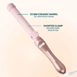The Pink Glitter B1.25 rotating curling iron featuring a 32 MM barrel in a pink glitter finish, ideal for creating voluminous waves.