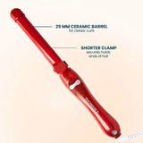The Beachwaver Red Glitter B1 rotating curling iron featuring a 1-inch barrel in a red glitter finish, ideal for creating tight, defined curls and waves.
